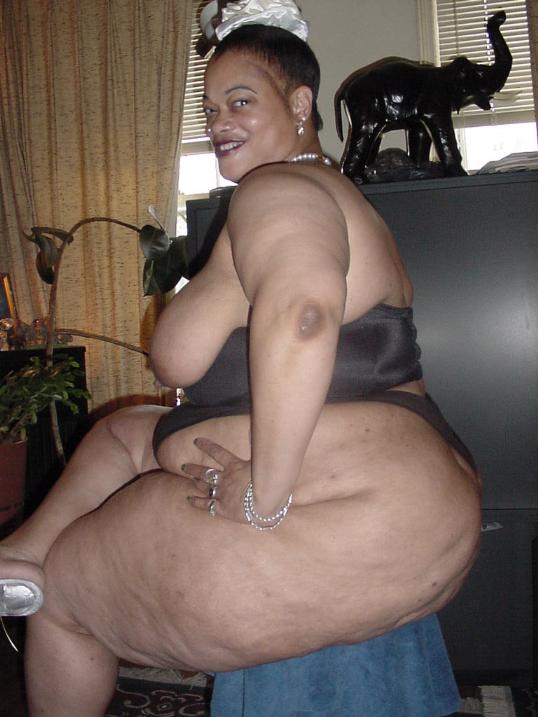 Fat Black Milf Anal - Very big black mama shows her fat ass
