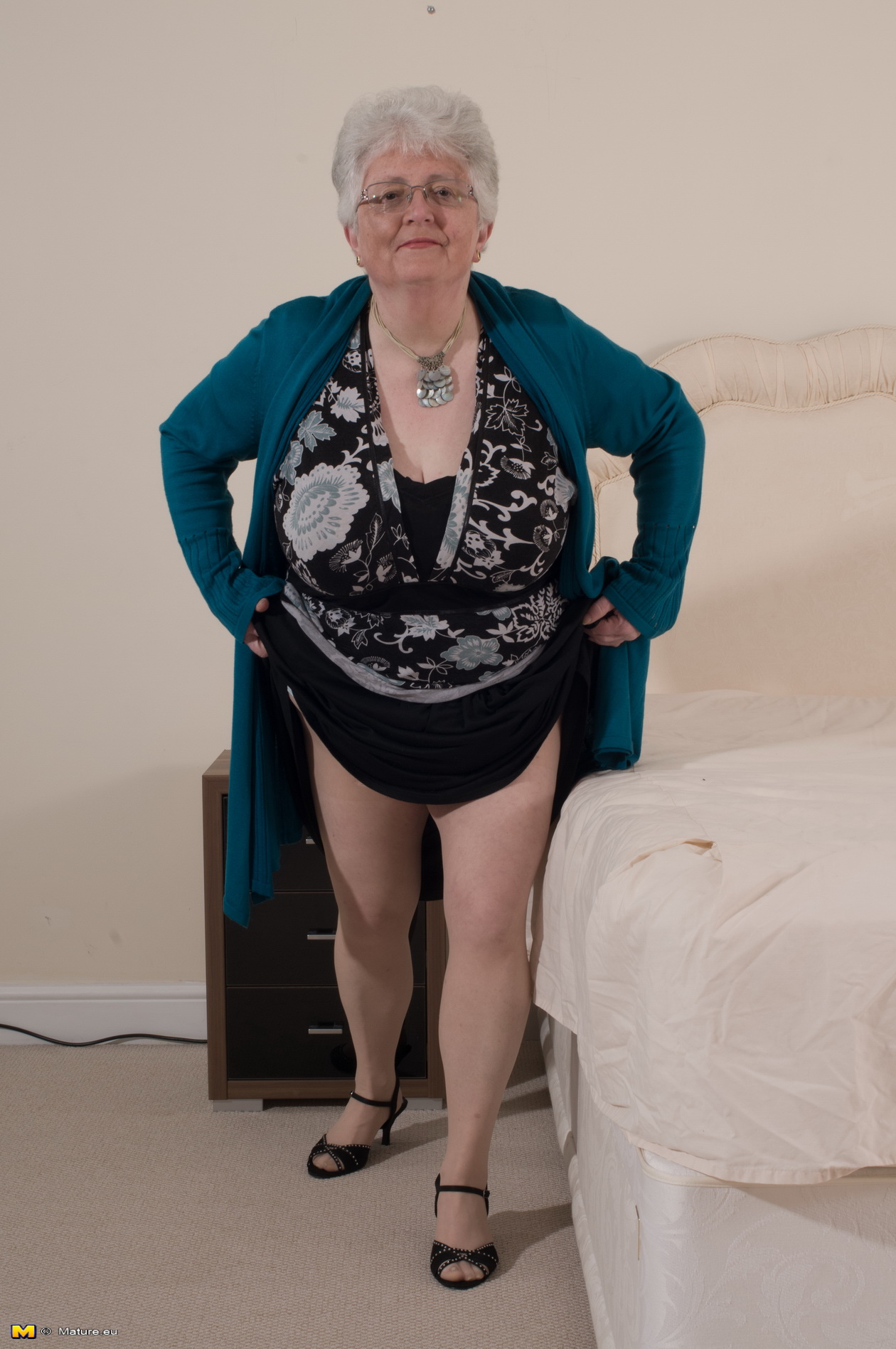 Naughty Big breasted British granny getting frisky image pic